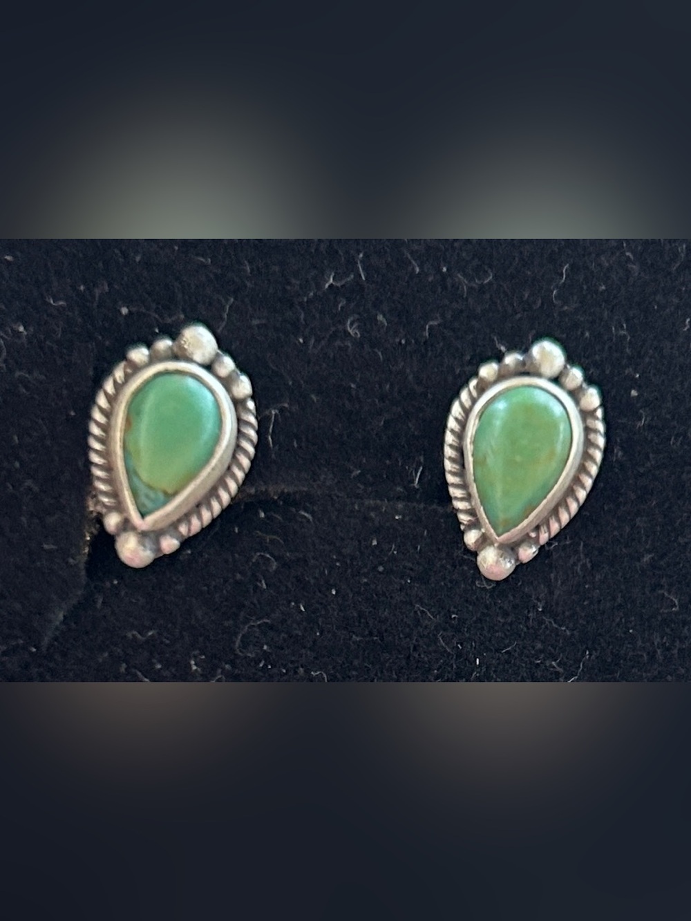 Genuine turquoise and sterling silver studs.